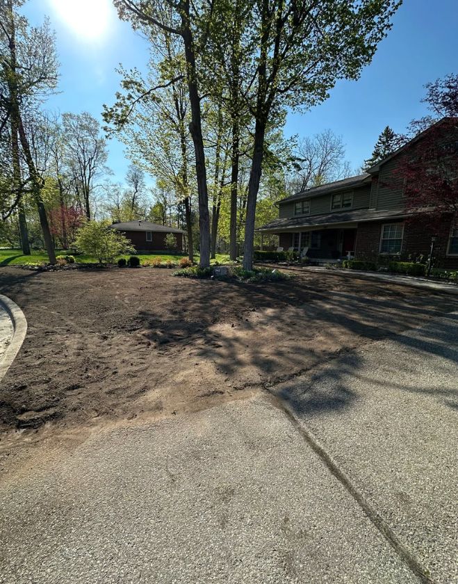 Gallery 20 A residential front yard completely stripped down to bare dirt and smoothly graded during a lawn replacement project in the Brant Hills neighborhood of Burlington, Ontario.